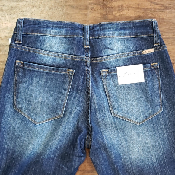 Mid-Rise Distressed Denim - Picture 6 of 9
